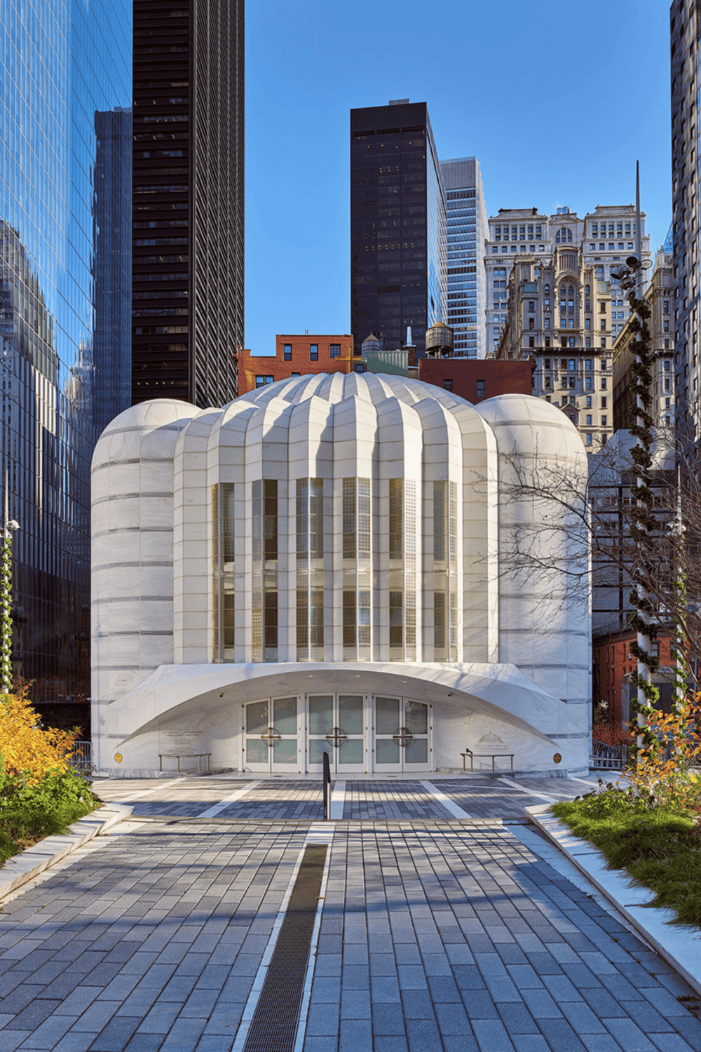 Modern cityscape with architectural landmark, tall skyscrapers, and vibrant urban environment.