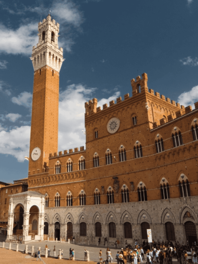 Renaissance Palace and Torre del Mangia in Siena, Italy, iconic medieval landmarks and tourist attractions.