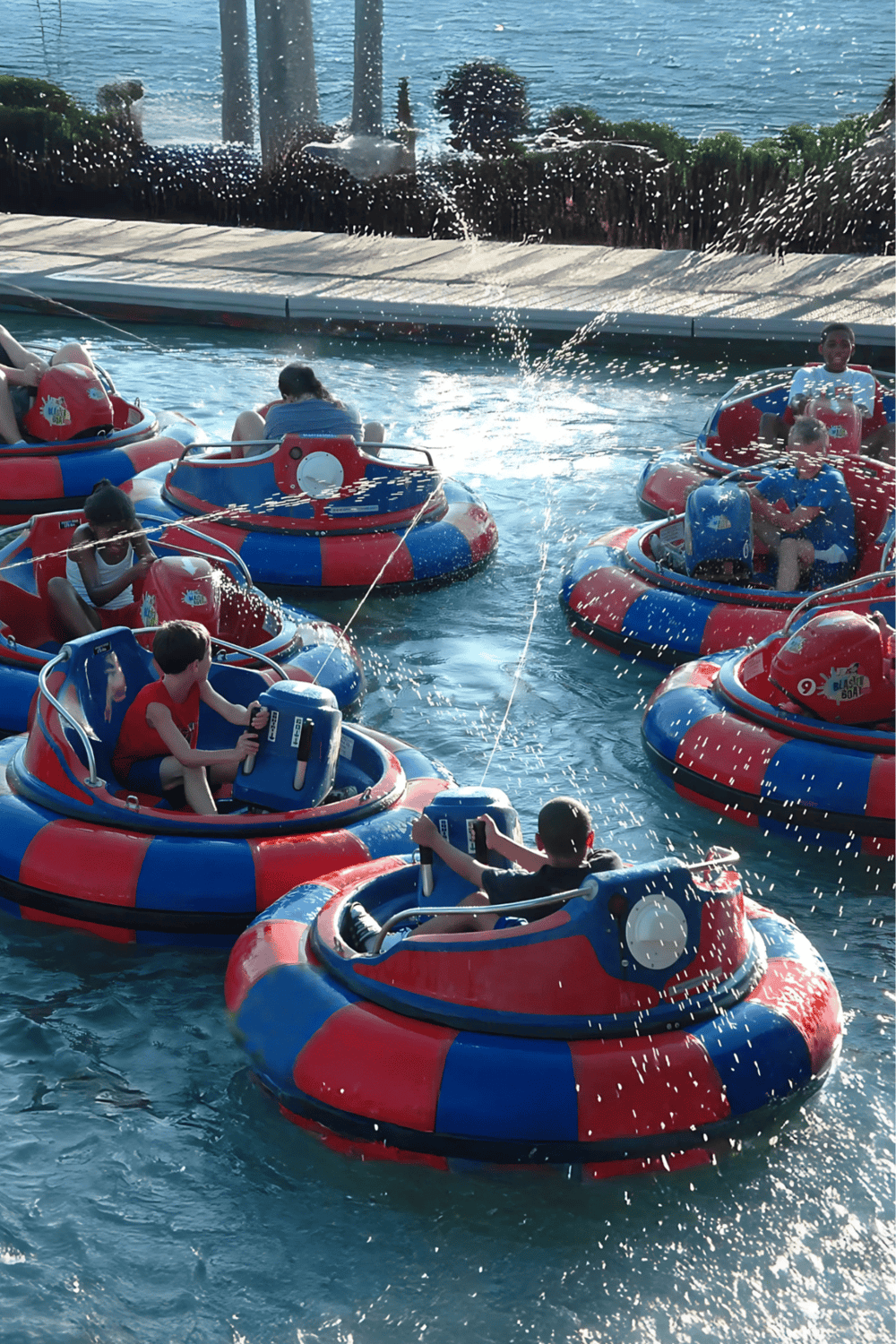 Rope bumper cars with children enjoying water park fun at QuestForDirections.