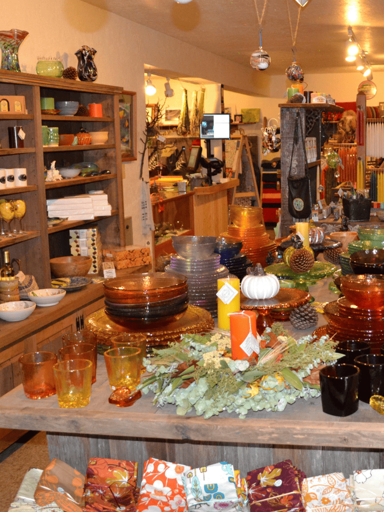 Colorful handmade pottery and seasonal decor at QuestForDirections gift shop.