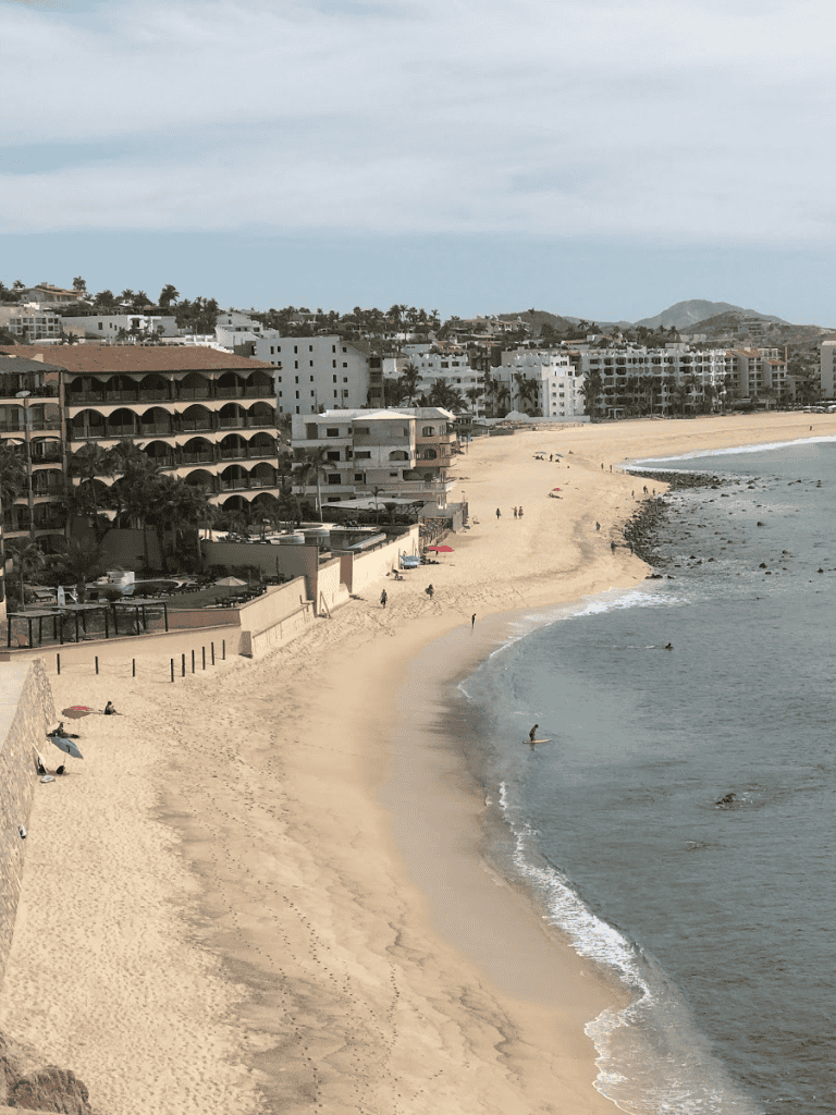 Stunning Malibu Beach with coastal resort hotels and scenic mountain views.