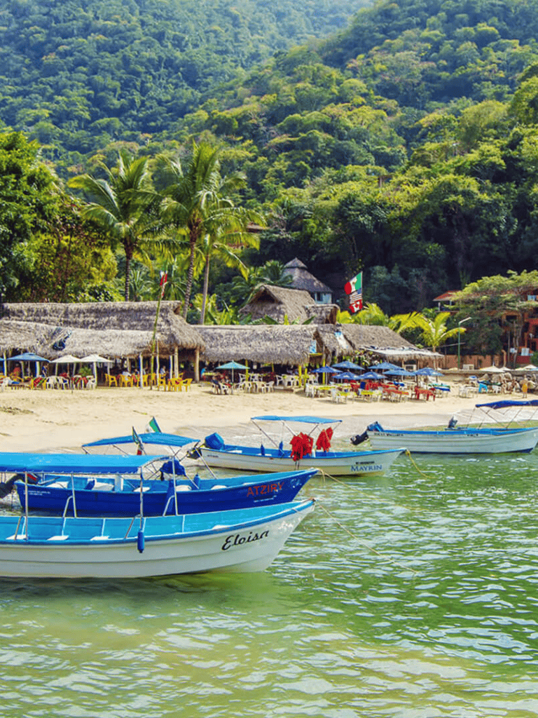 Vibrant beach scene with boats, lush green hills, and tropical huts, ideal for exploring seaside destinations.