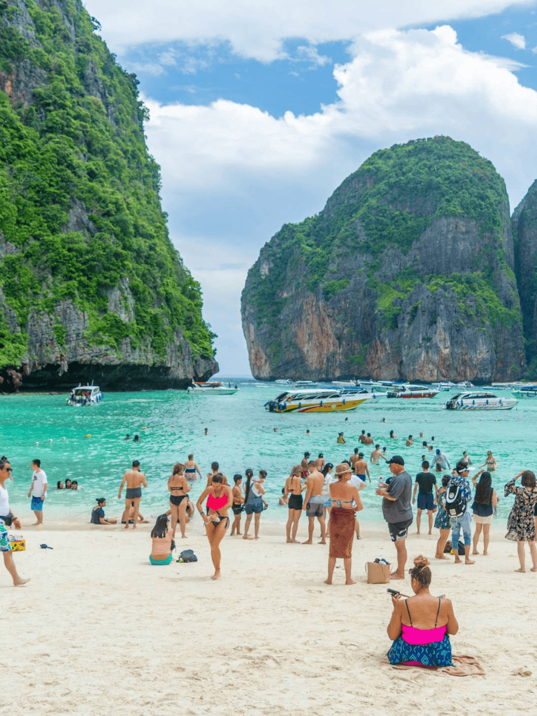 Lush tropical island scenery with turquoise waters and limestone cliffs, perfect for travel and adventure.