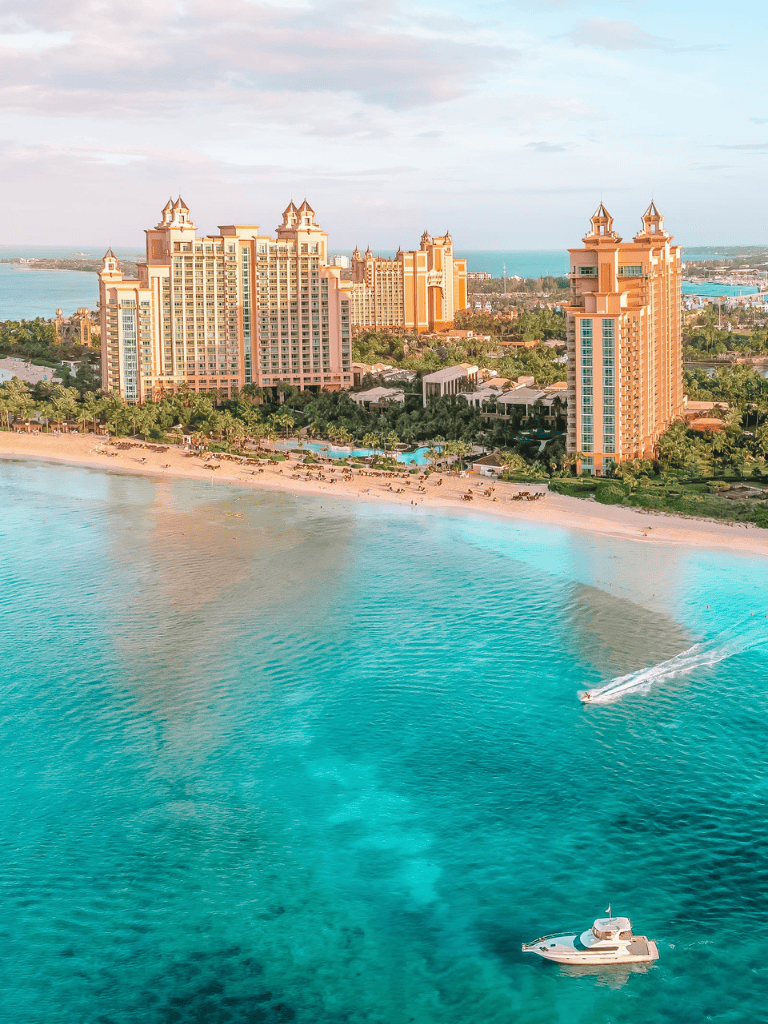 Luxurious beachfront hotel in Cancun, Mexico with ocean views and tropical surroundings.