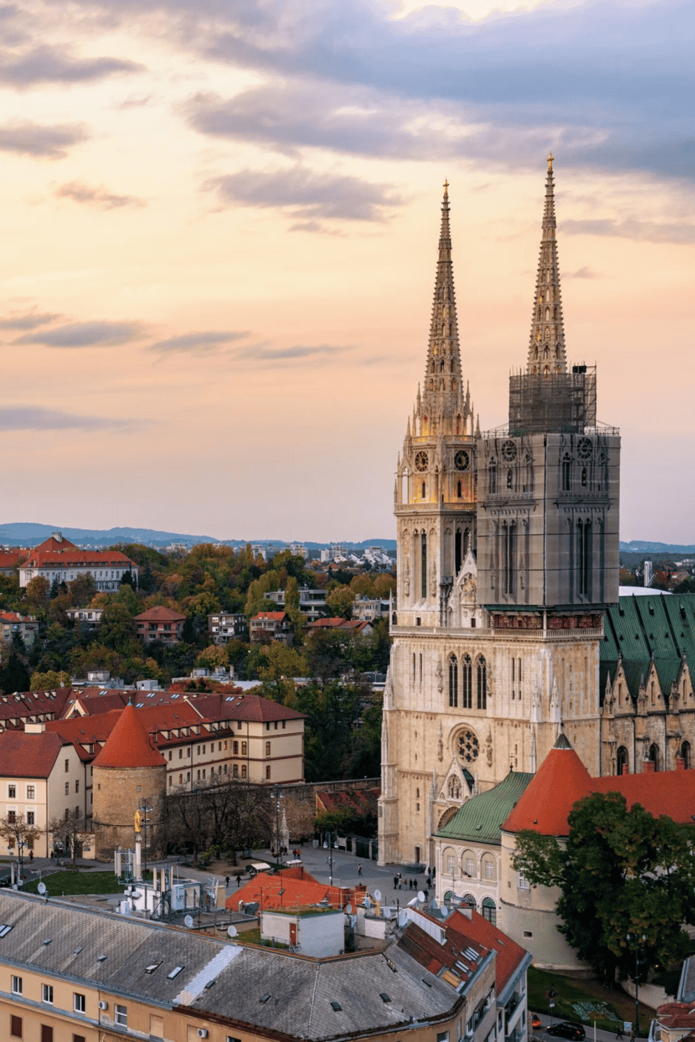 St. Mary's Church in Zagreb, Croatia, skyline view at sunset, historic architectural landmark for travel inspiration.