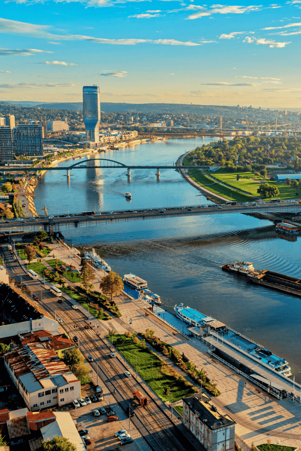 Modern cityscape of Brisbane, Australia with river views, bridges, high-rise buildings, and green spaces, perfect for urban navigation.