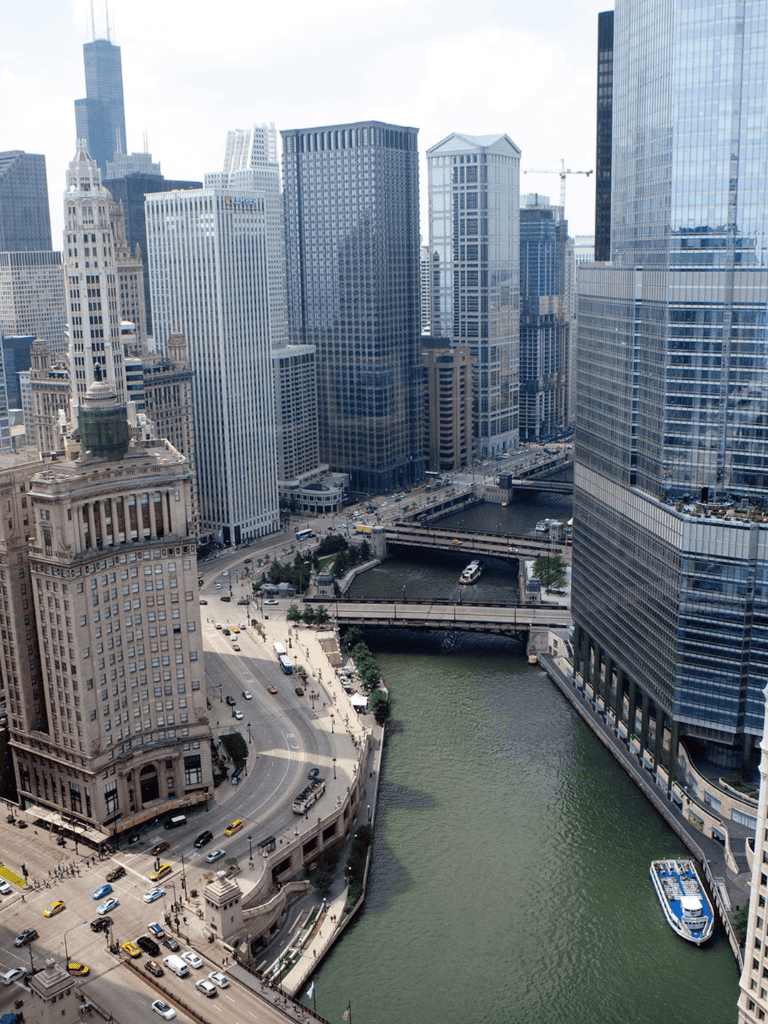 Chicago city skyline with river and skyscrapers, urban travel destination.