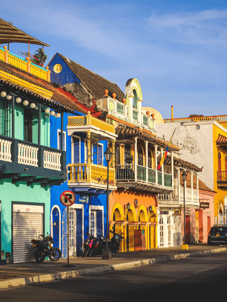 Vibrant colorful buildings in a historic Mexican town, showcasing lively architecture and culture.