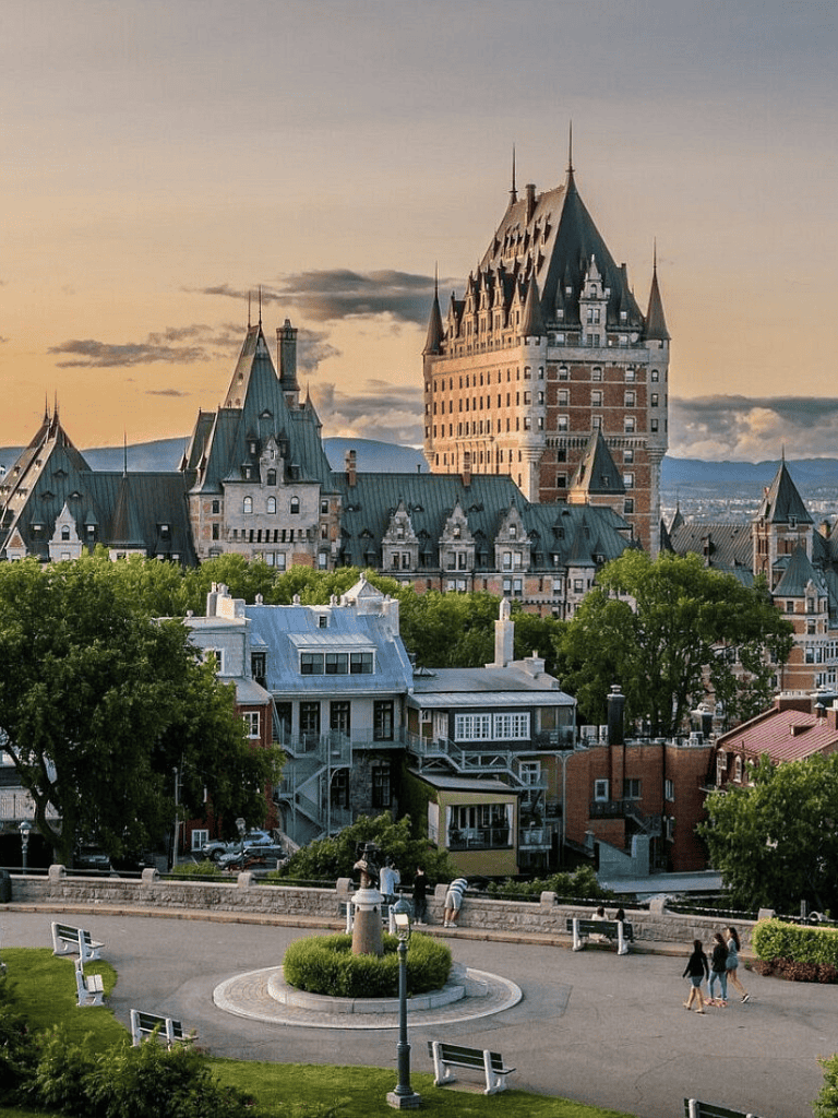 Fairy-tale Château Frontenac hotel in Quebec City at sunset, showcasing historic architecture and scenic views.