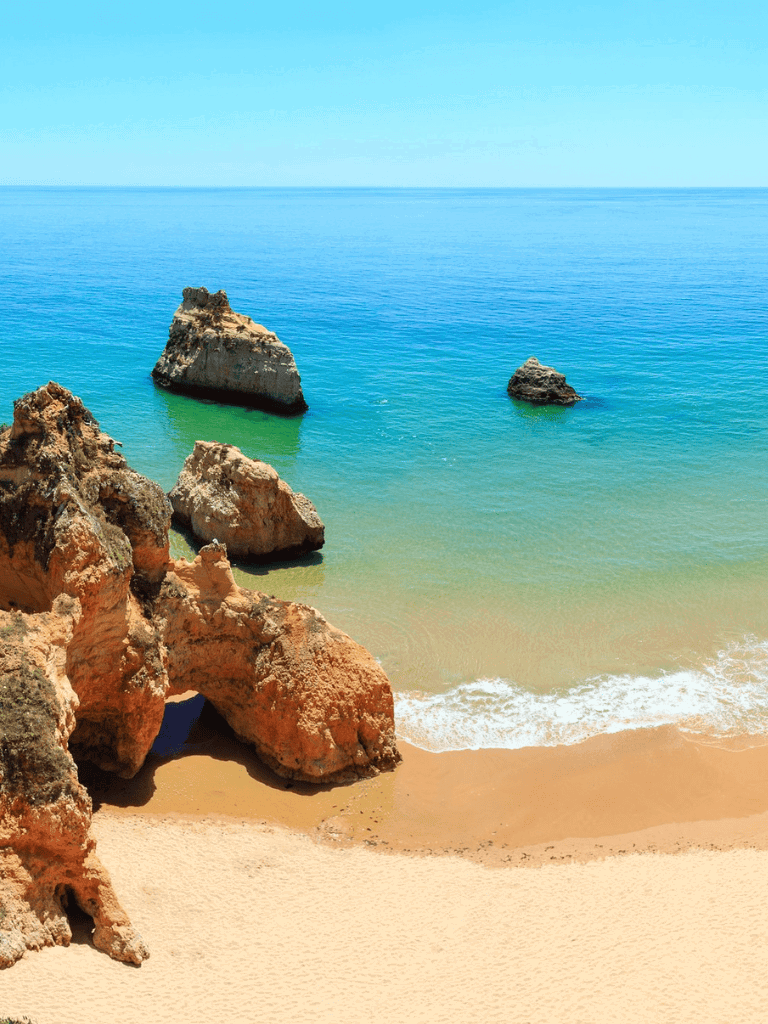 Stunning coastal rocks and turquoise waters at the beach, scenic ocean view, perfect for travel and adventure.