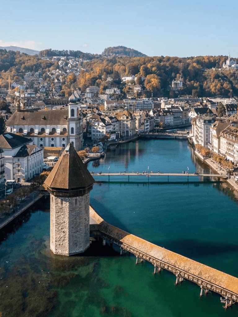 Charming Swiss city with historic architecture and picturesque river views, perfect for travel planning.