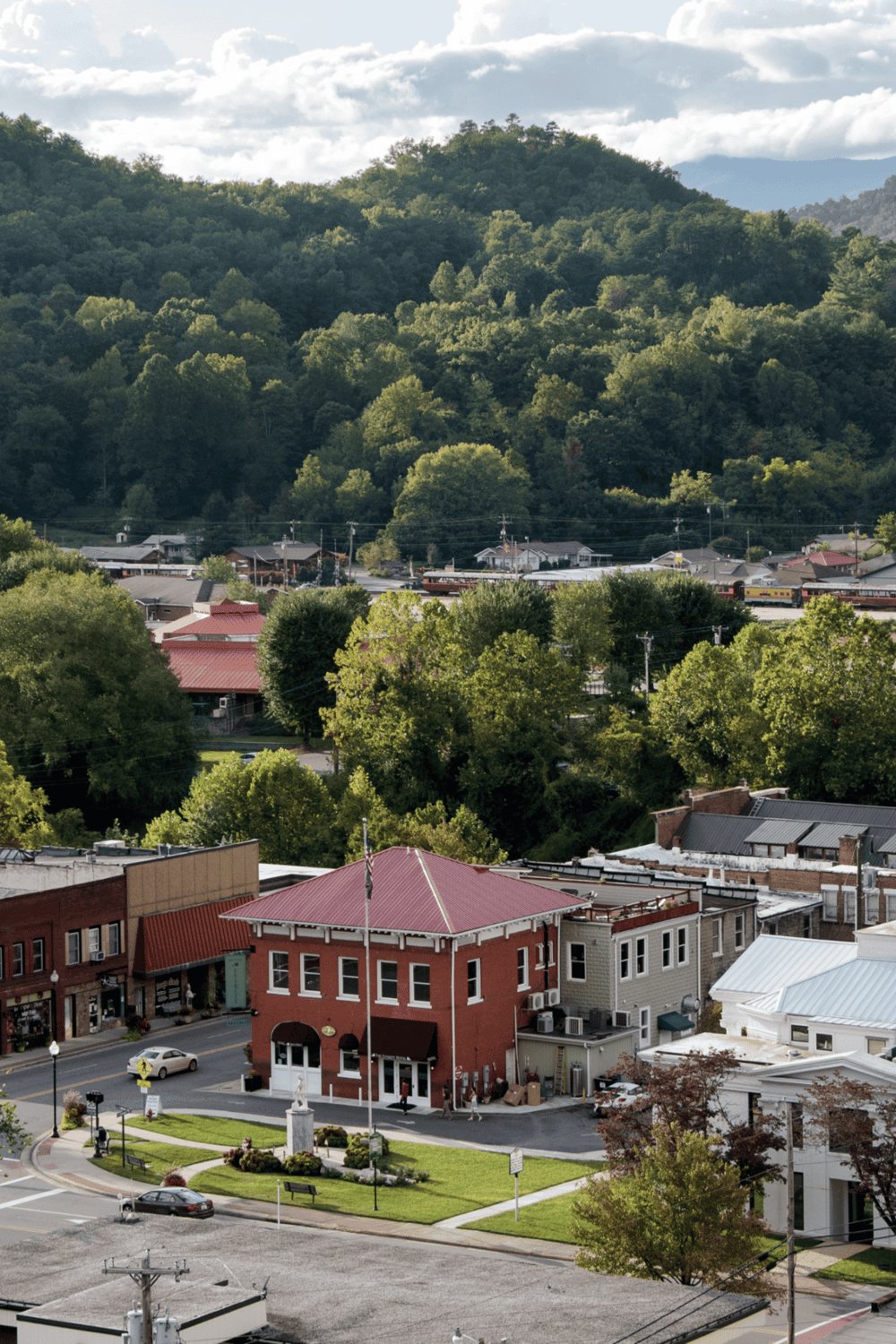 Historic downtown town with scenic mountain views and lush green trees, perfect for travel and exploring.