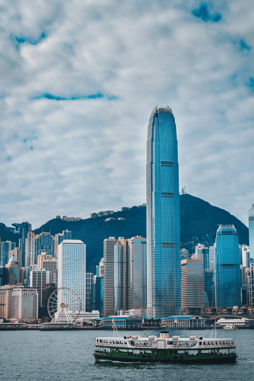 Stunning view of Hong Kong skyline with skyscrapers and Victoria Harbour.
