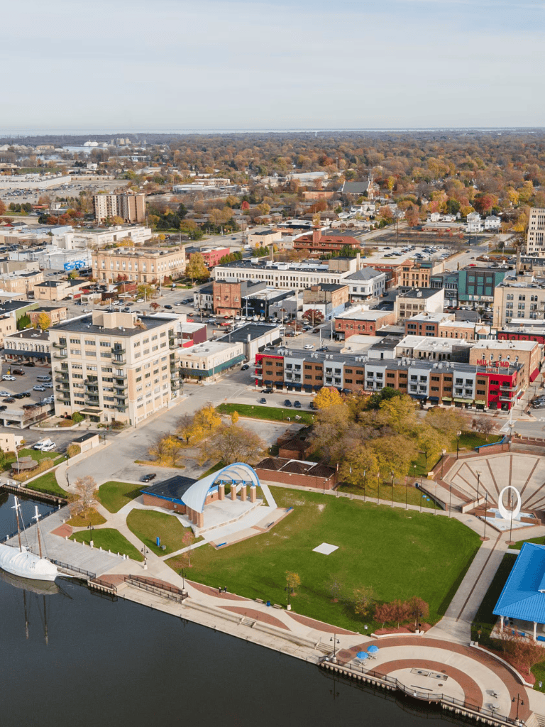 Accessible downtown park with water views and community amenities in QuestForDirections city.