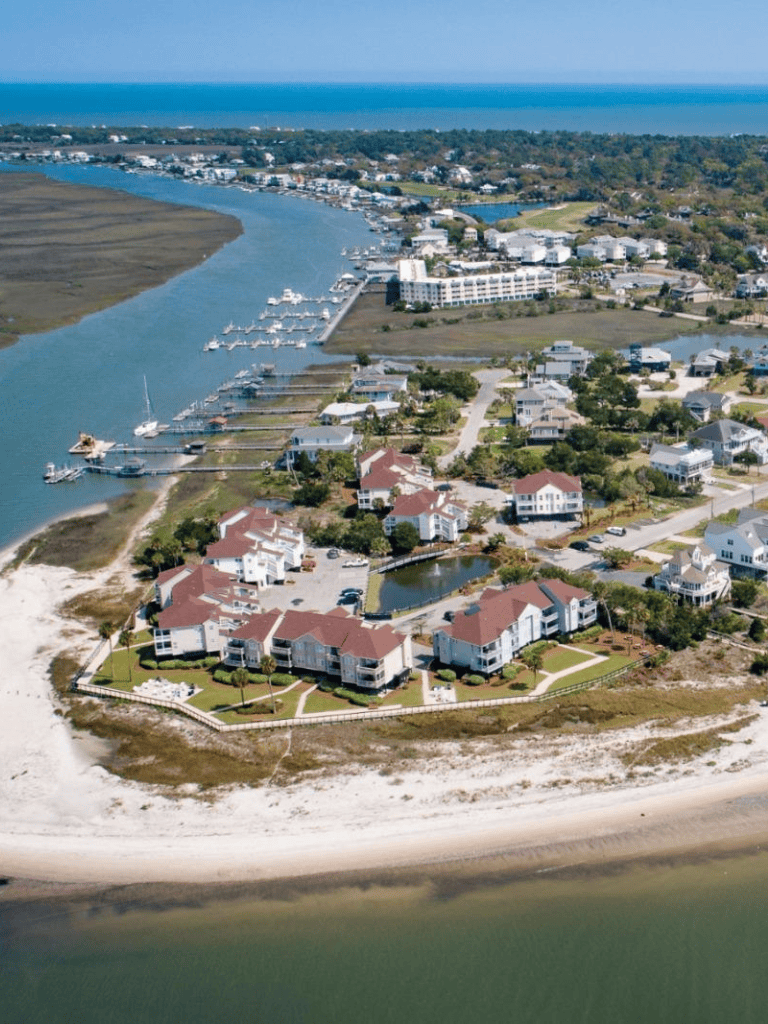 Beautiful coastal residential neighborhood with waterfront homes and marina access.