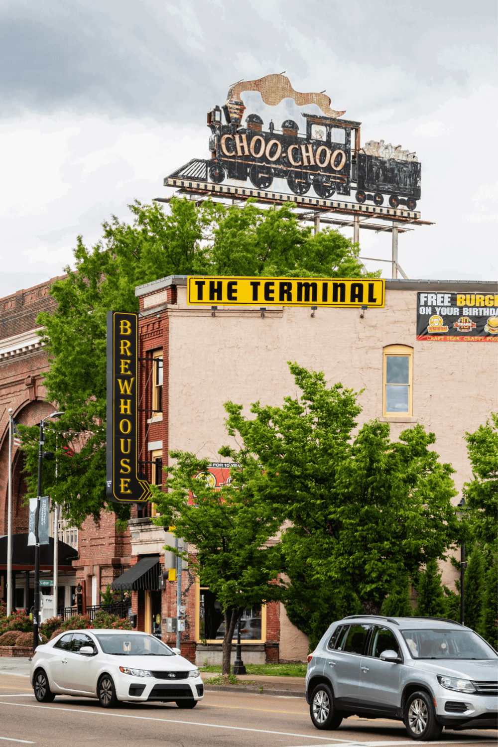 Choo Choo train marquee on roof of building, QuestForDirections SEO city landmark.