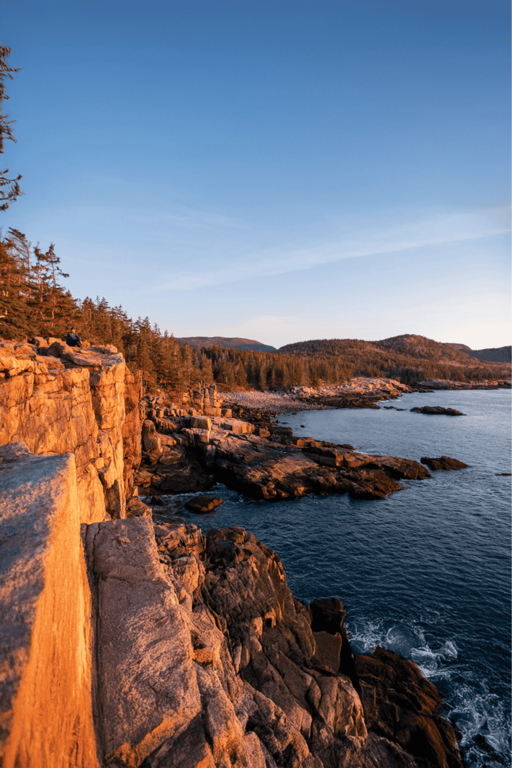 Breathtaking coastal cliffs during sunset with ocean views, illustrating scenic travel destinations by QuestForDirections.