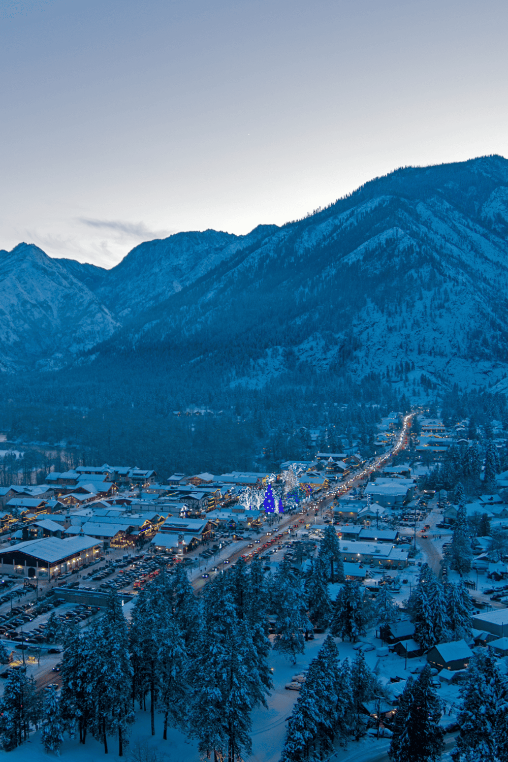 Snowy mountain town in winter, popular travel destination with scenic mountain views and cozy holiday atmosphere.