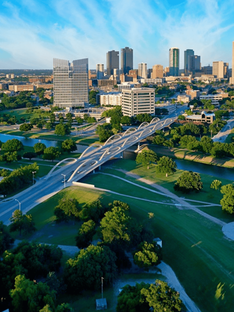 Urban cityscape featuring modern skyscrapers and a scenic park with a unique bridge.