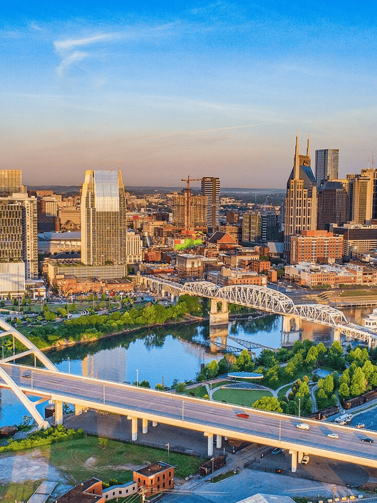 Vibrant city skyline Nashville Tennessee downtown with bridges and river, urban travel, and directions.