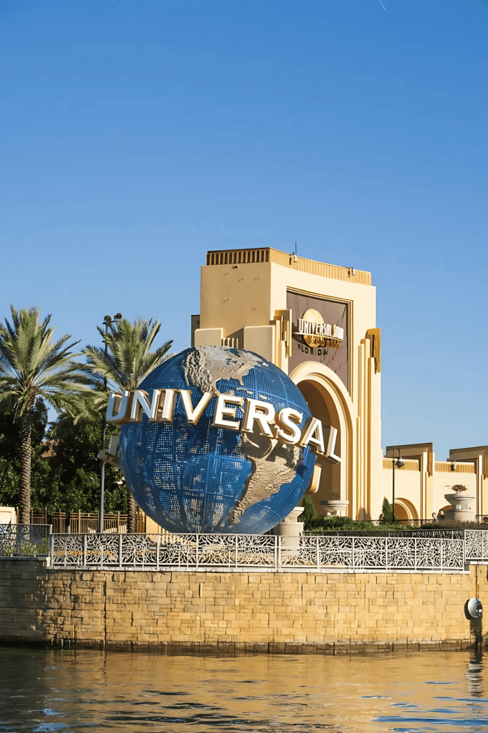 Colorful Universal Studios Florida theme park entrance with iconic globe and architecture.