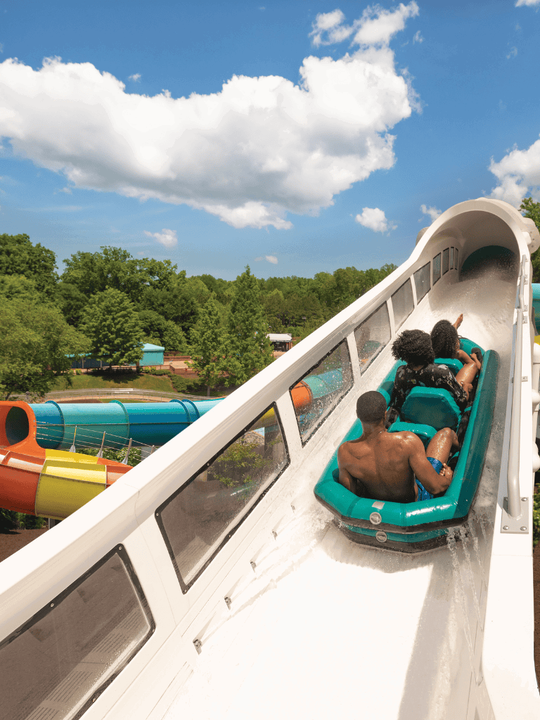 Thrilling water slide attraction at Quest for Directions amusement park, perfect for family fun and outdoor adventures.