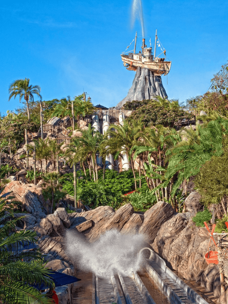 Thrill ride at Quest for Directions amusement park featuring water slides and themed attractions.