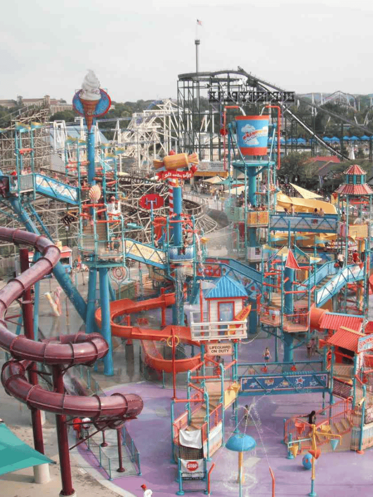 Water park with slides, rides, and attractions for family fun and entertainment.