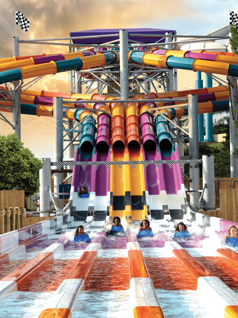 Bright water slides at QuestForDirections amusement park for family fun and thrilling rides.