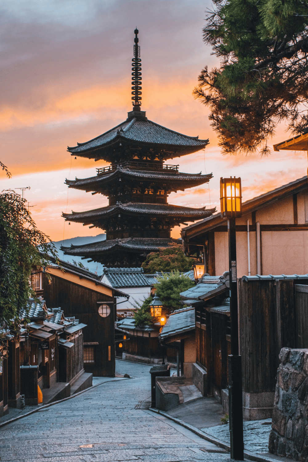1. Traditional Japanese pagoda at sunset in Kyoto, Japan.