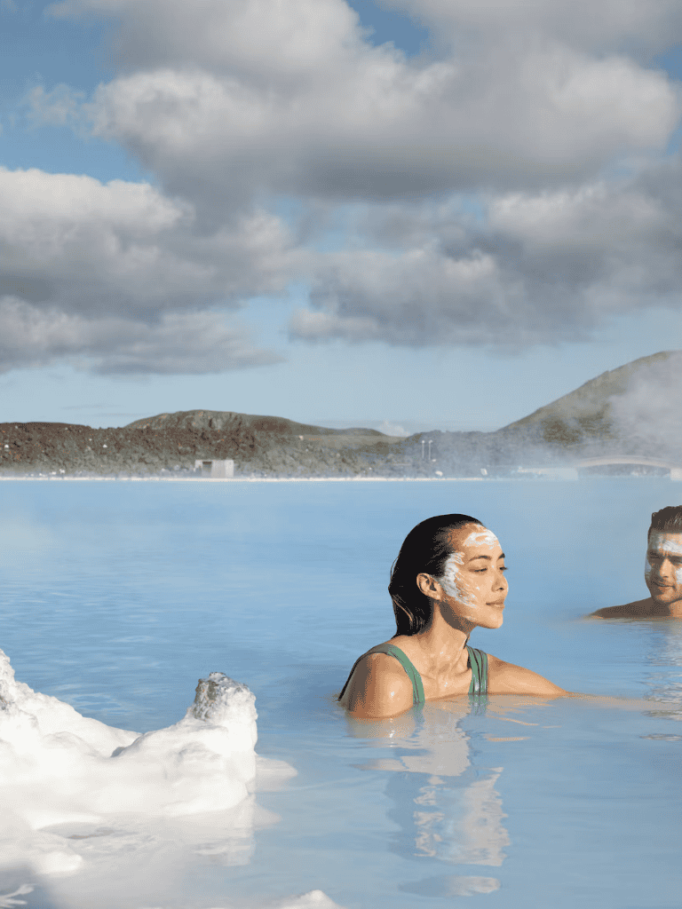 Relaxing hot spring experience with scenic geothermal landscape, steam, and wellness benefits.