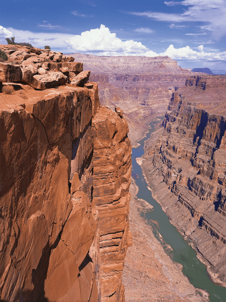 Breathtaking Grand Canyon view with rugged rock formations and the Colorado River below.