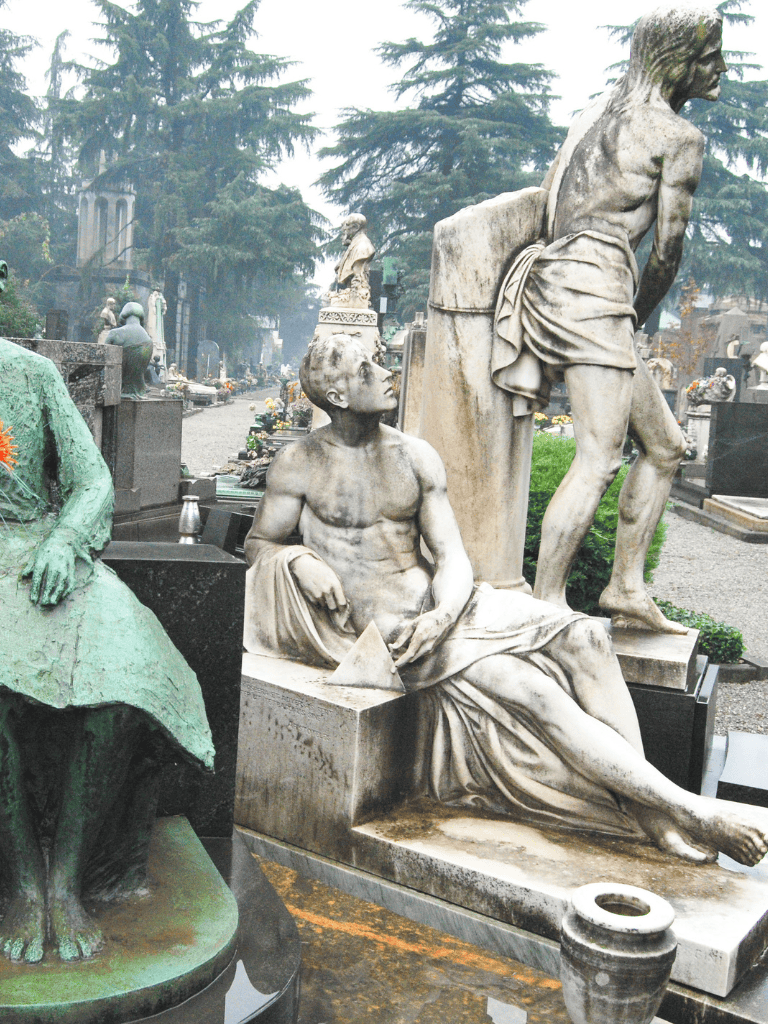 Old cemetery with statues and graves, life's final resting place, Memorial site, historical tombs, cultural heritage.