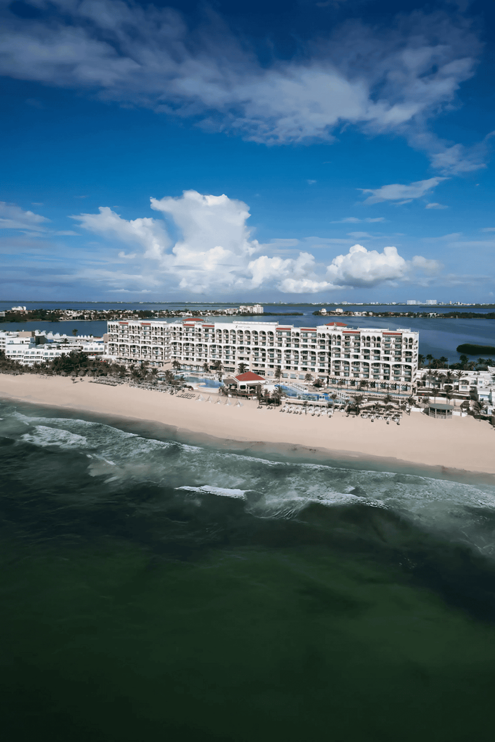 Luxury beachfront resort with ocean views and sandy beach in South Florida, perfect for vacation.
