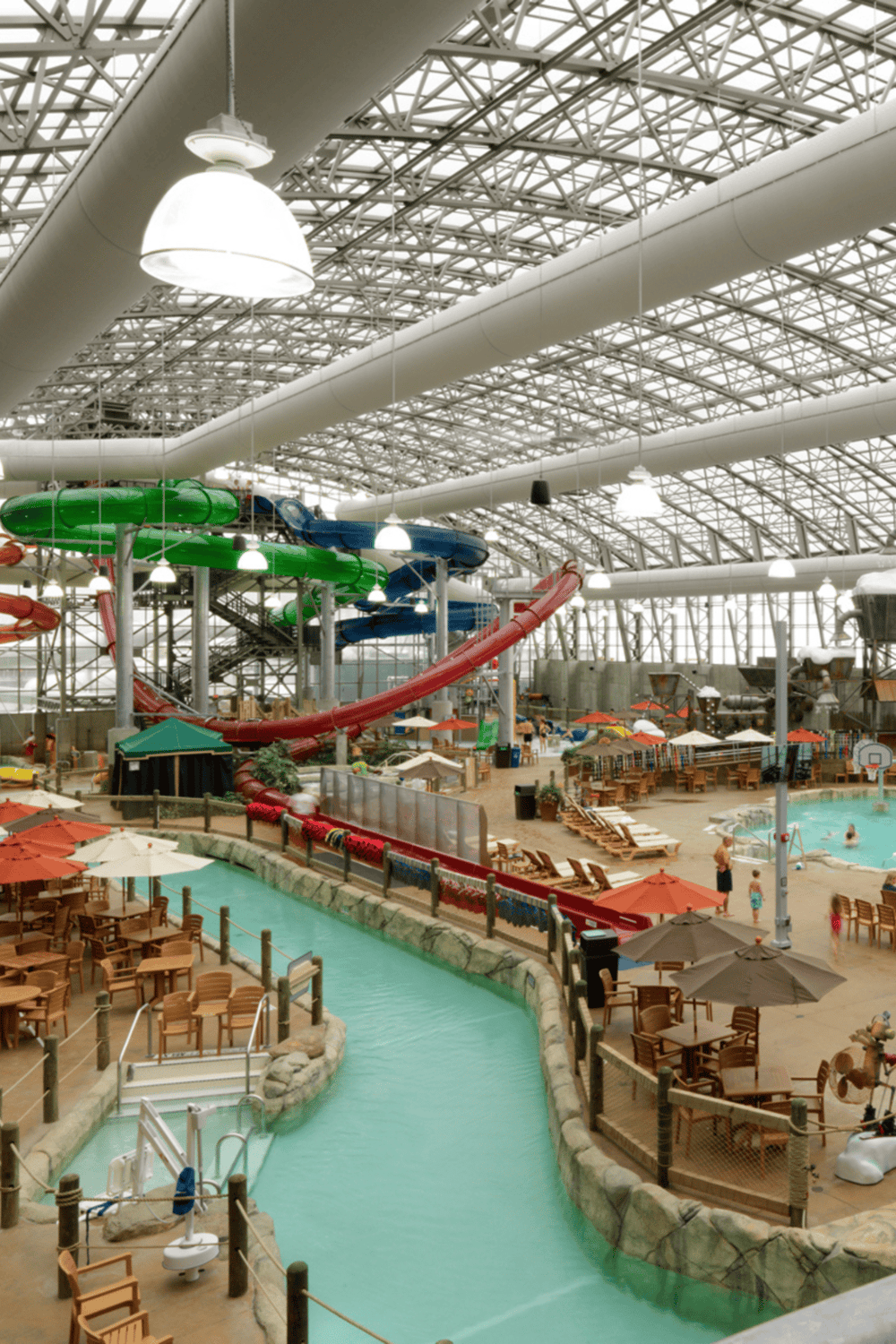 Indoor water park with water slides, lazy river, and recreational activities for family fun.