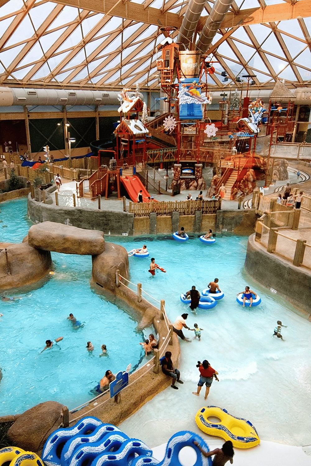 Water park indoor adventure with slides, lazy river, and kids' play area at QuestForDirections.