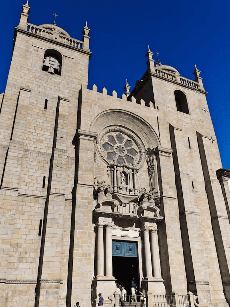 St. Dominic's Church in Lisbon, Portugal, with historic architecture and vibrant blue sky.