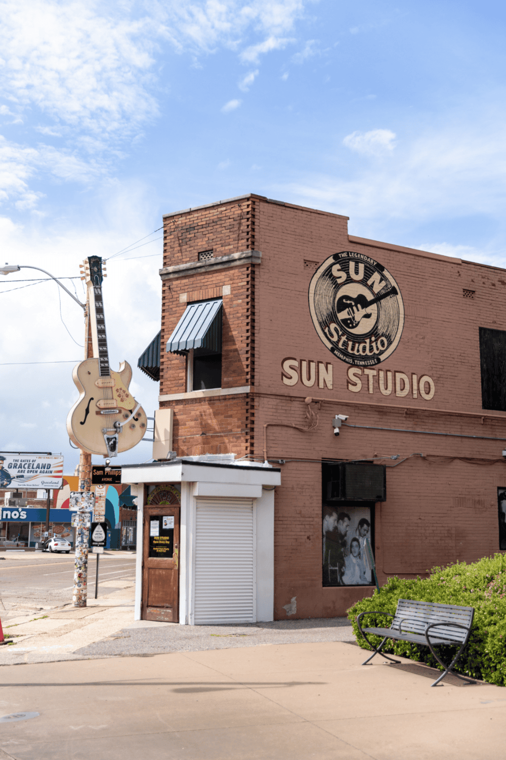 Vintage guitar sign outside Sun Studio Memphis Tennessee music history.