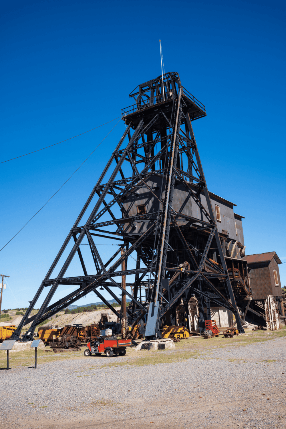 Rustic old mining headframe at QuestForDirections historic site, Nevada outdoor attraction.