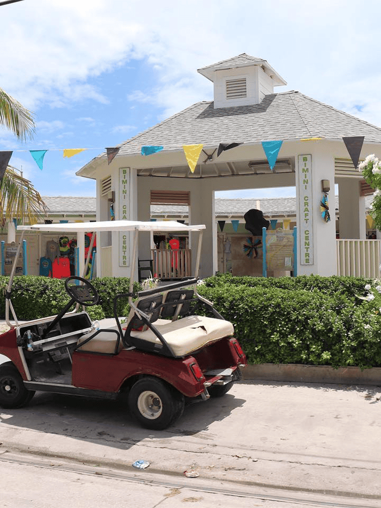 Colorful seaside mini golf cart rental at Quest for Directions, Florida golf and adventure park.