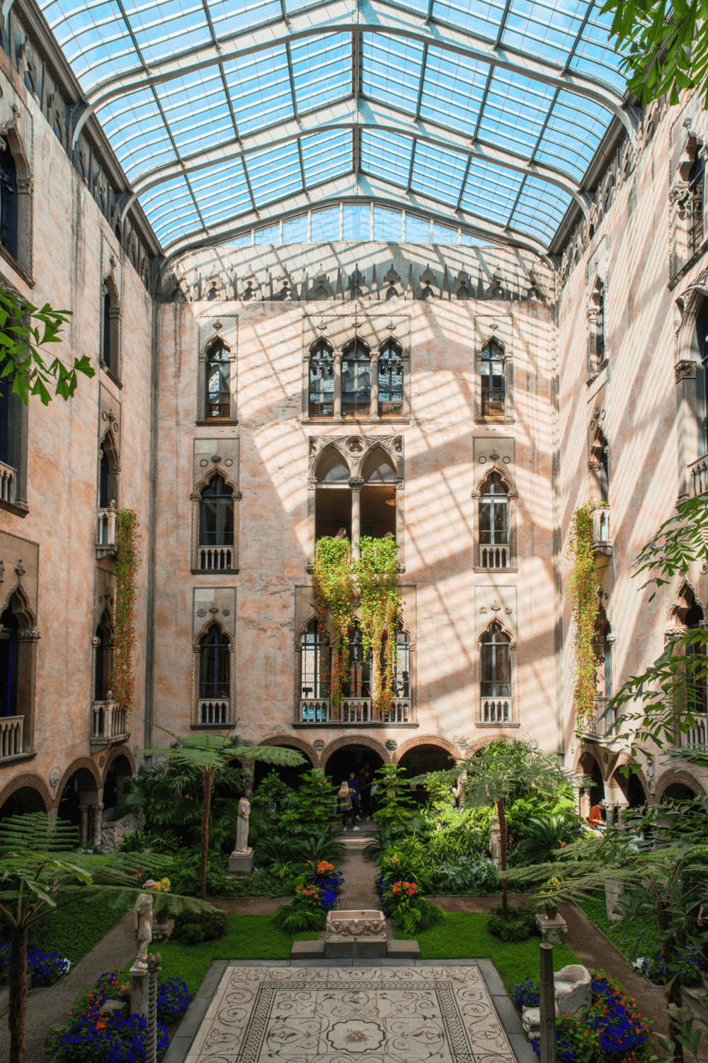 Ancient building interior with lush courtyard garden and glass ceiling, inspired by quest for exploration and adventure.
