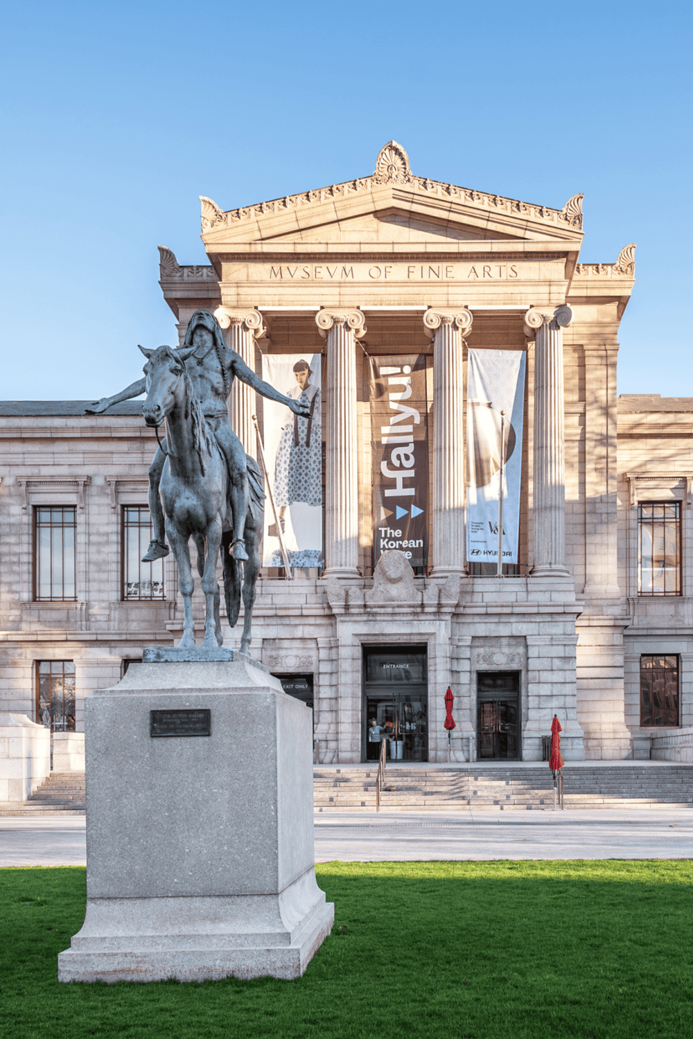 1. Museum of Fine Arts building with classical architecture and statue, educational cultural destination.