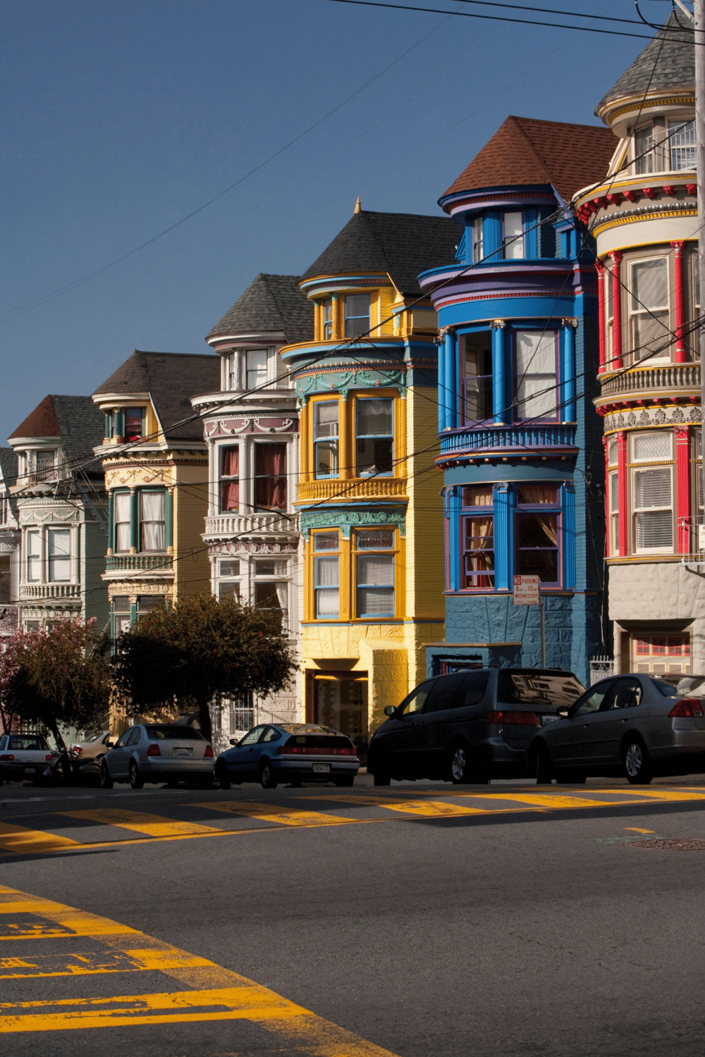 Colorful Victorian houses in San Francisco with vibrant exterior paint.