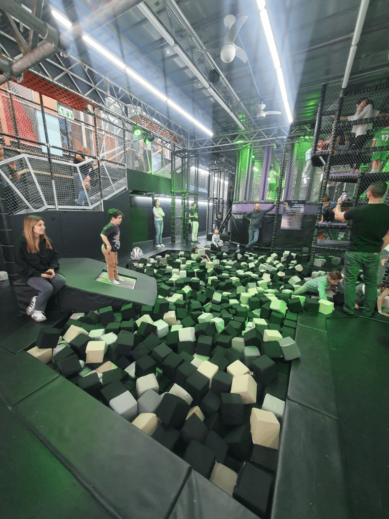 1. Indoor trampoline park with foam pits and climbing areas for kids and teens.