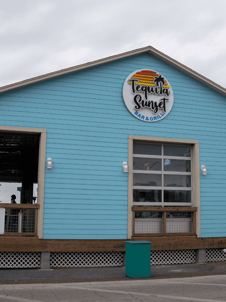 Tequila Sunset Bar & Grill exterior, beachside restaurant with ocean view, casual dining.