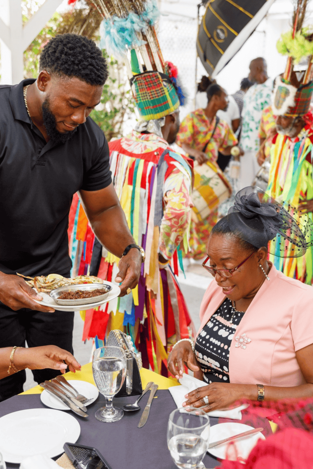 Traditional African cultural celebration with vibrant costumes and dancing.