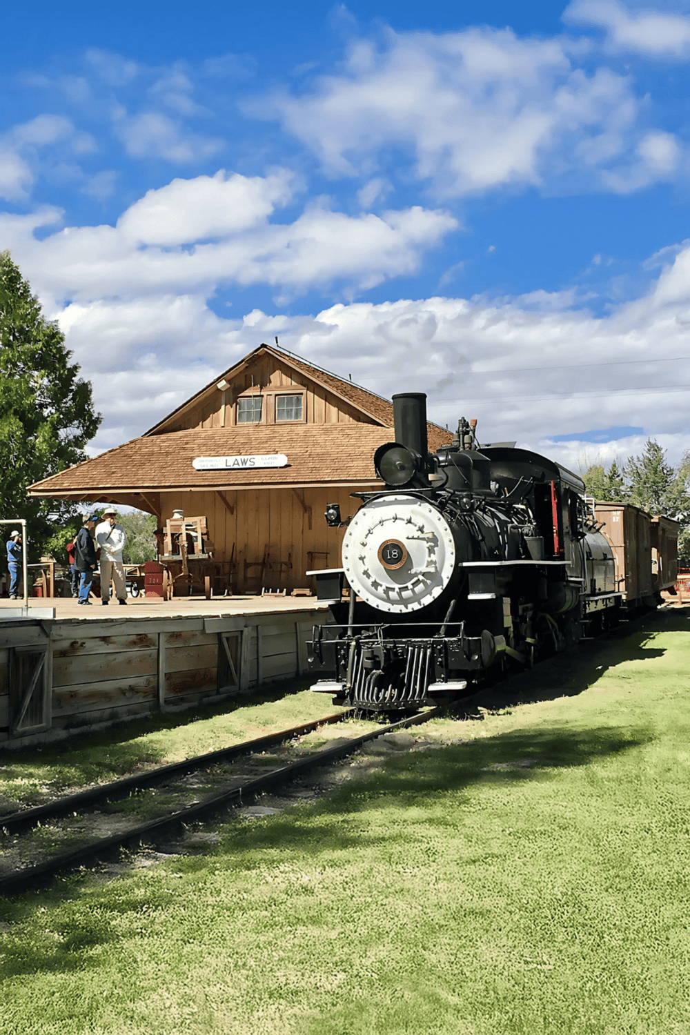 Steam train at historic railroad station, vintage locomotive, restoration, scenic outdoor location, Quest for Directions.