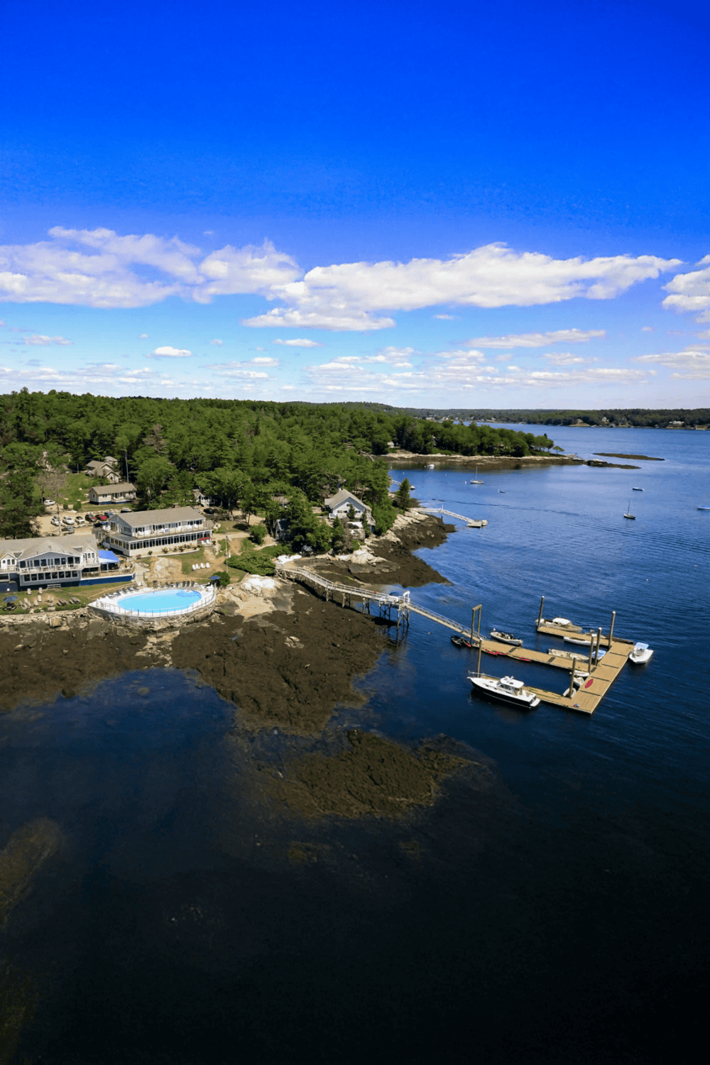 Relaxing waterfront house with boat dock on scenic lake, perfect for outdoor adventure and family vacation.