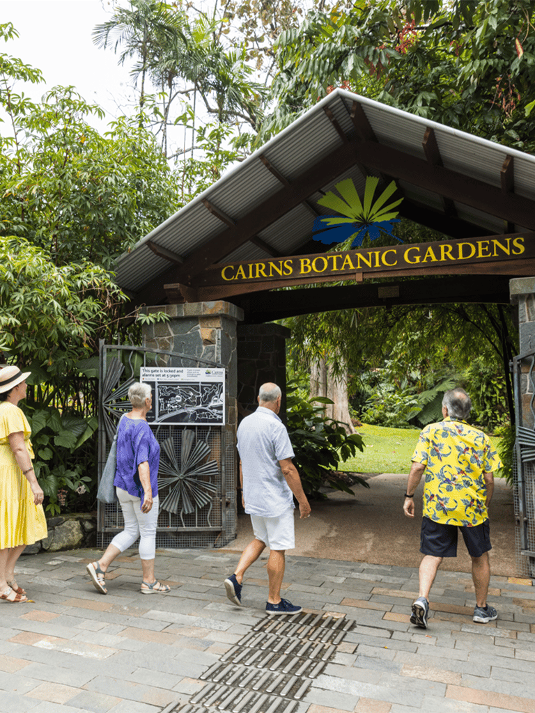 Lush tropical entrance to Cairns Botanic Gardens in Queensland, Australia.
