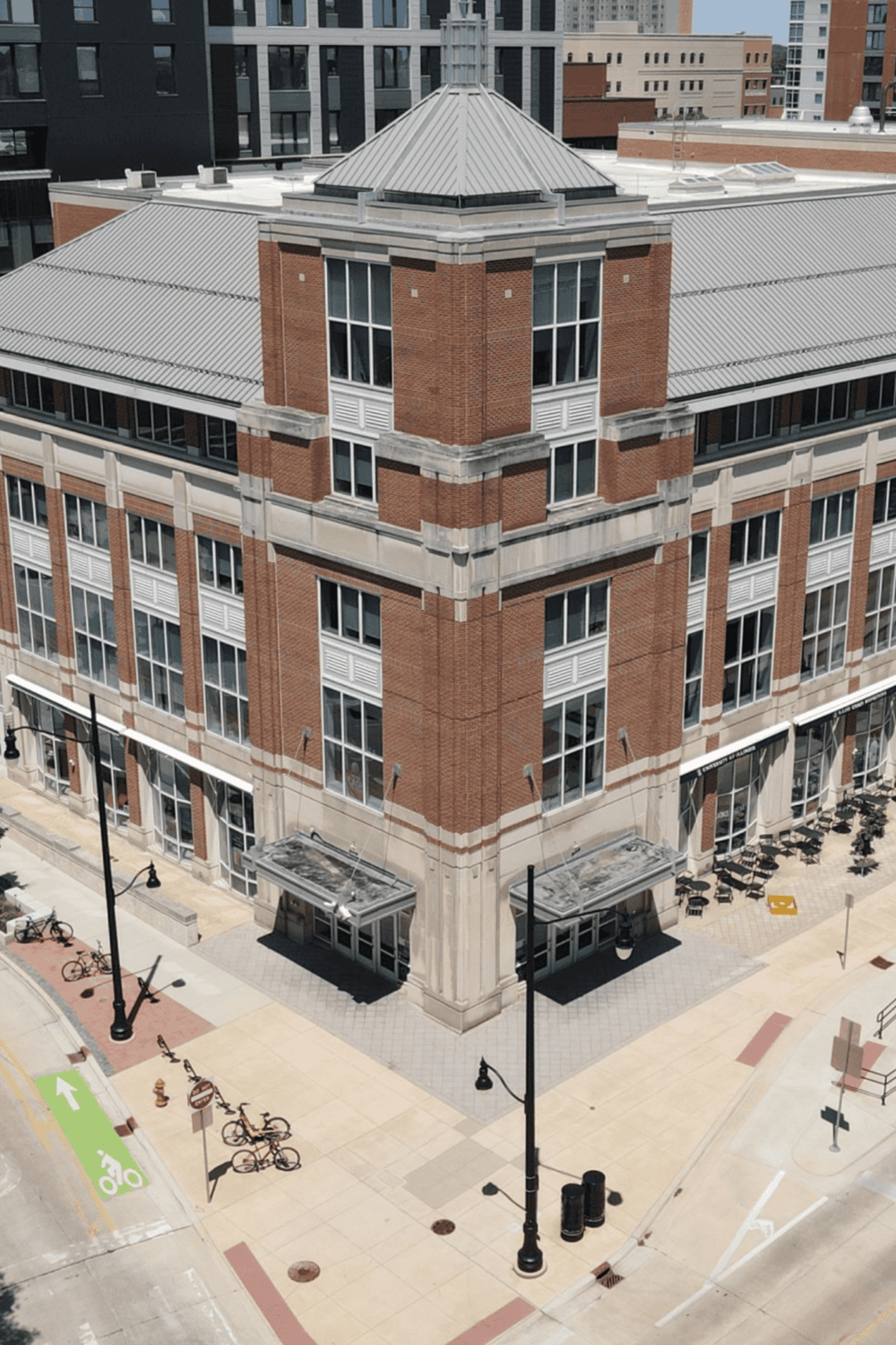 Luxury urban building with brick facade and large windows for city living.